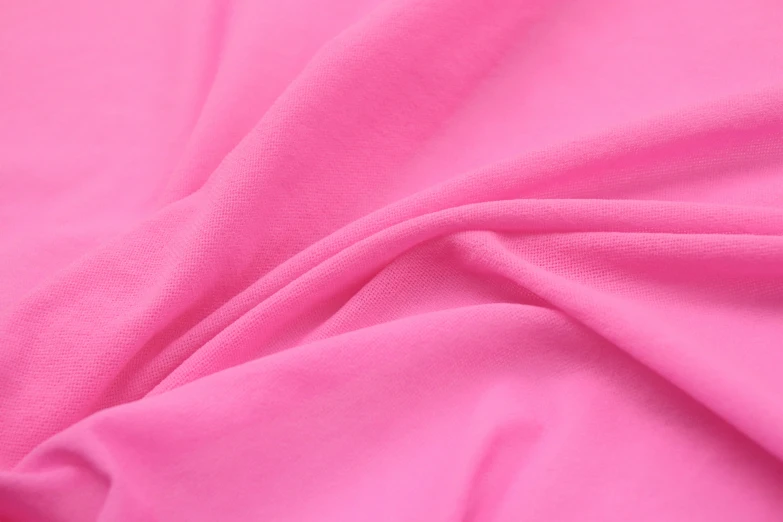 a bright pink cloth with tiny folds on it