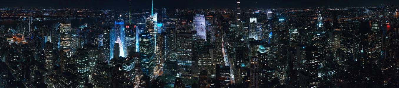 an aerial view of the city lights at night