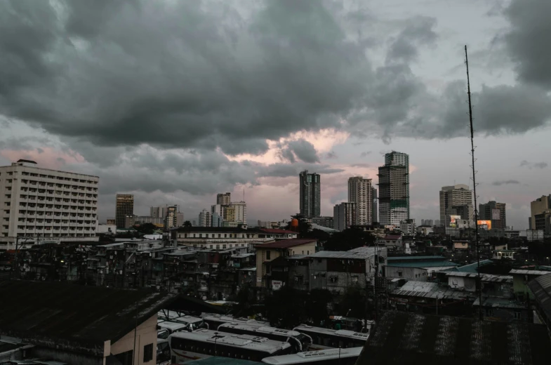 the clouds are very dark over the city