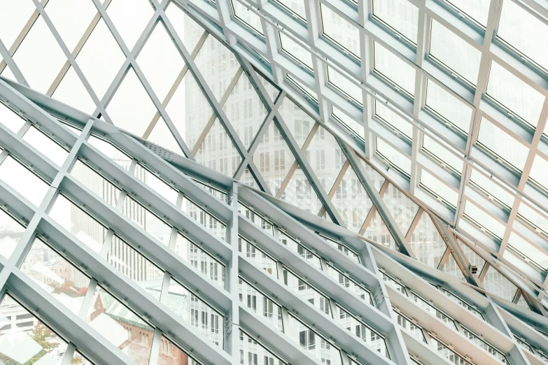 a couple of people standing in a large atrium