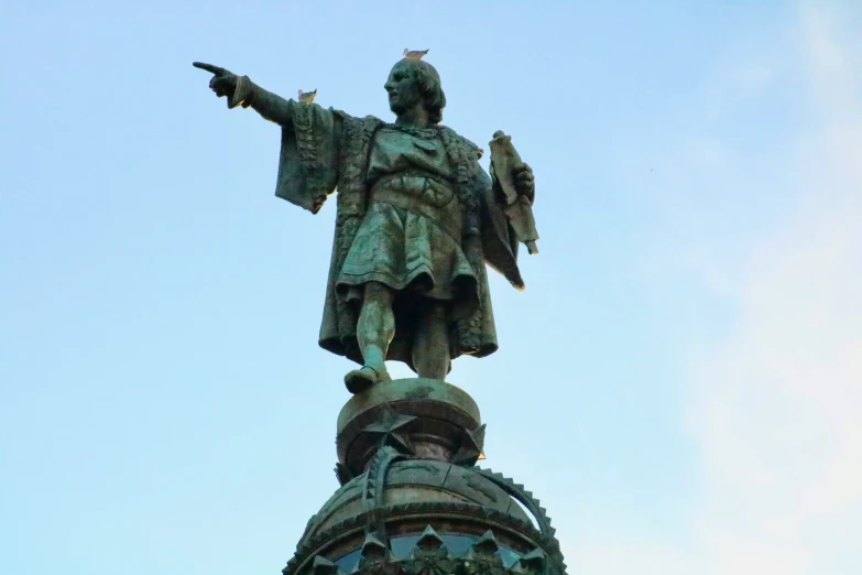 a statue is seen with its arm out