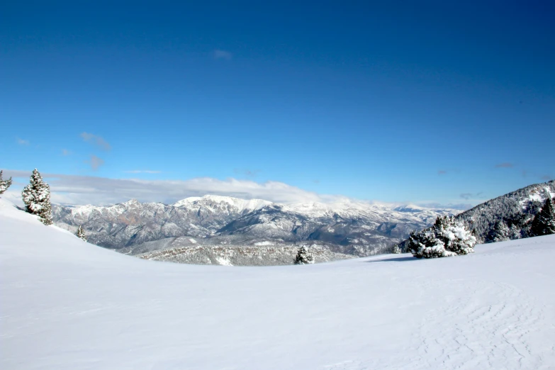 a person is skiing on the snow slope