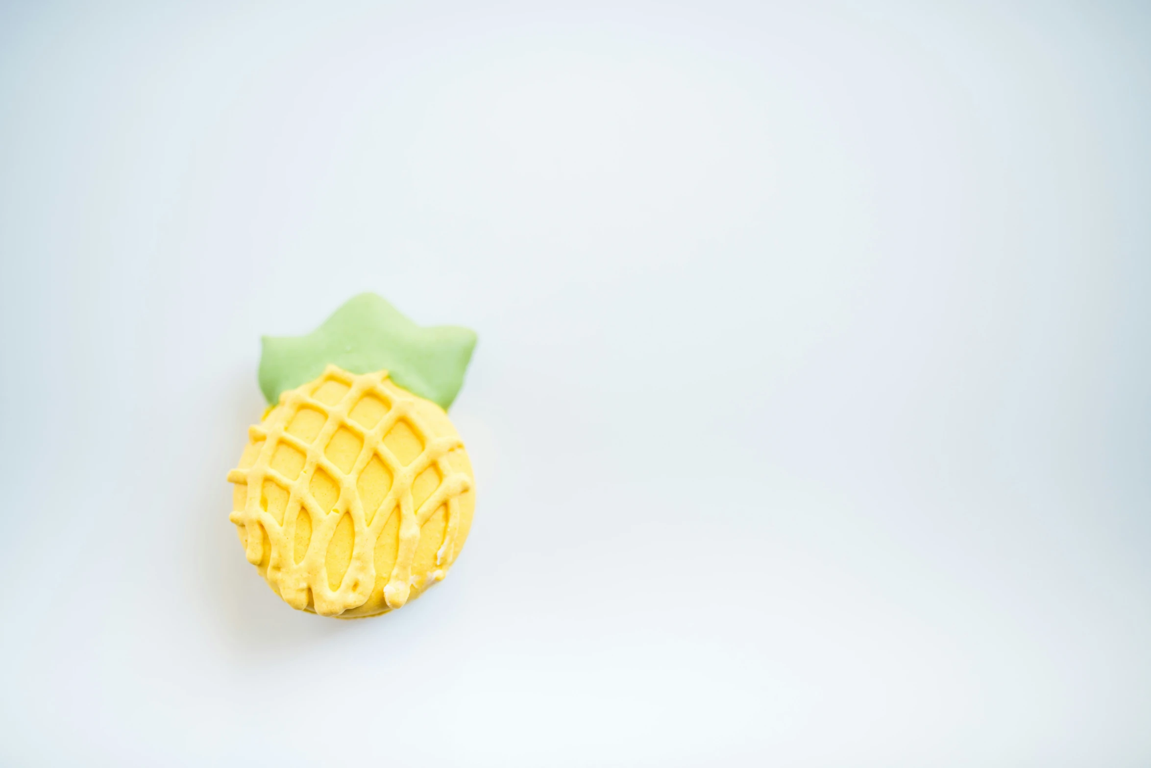 a pastry made to look like a pineapple is seen