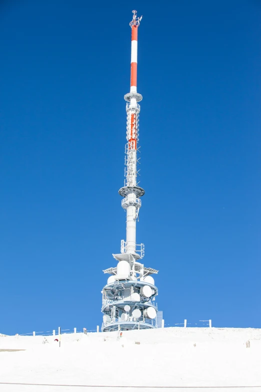 a large building with a tall white tower