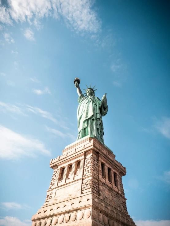 the statue of liberty is on top of the tower