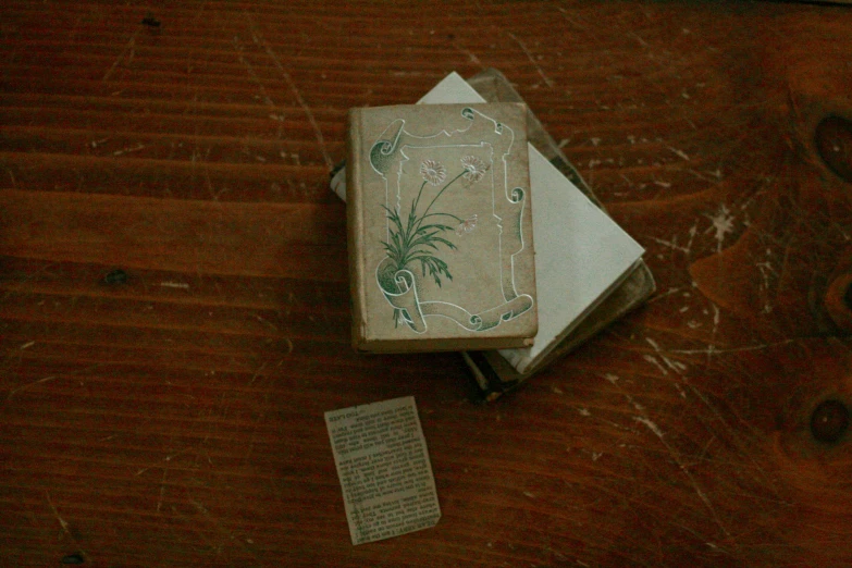 an old match box that is on a table