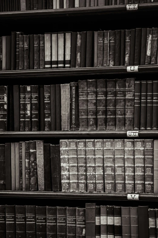 a close up of rows of books in a liry