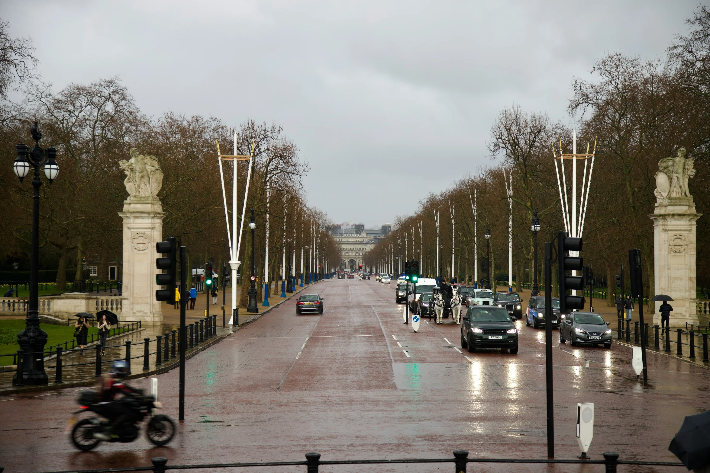 the cars are parked along a city street