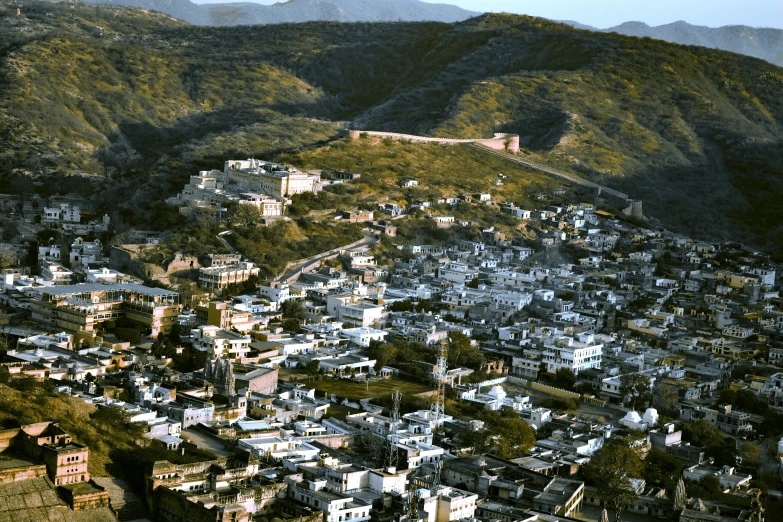 a very big city is near some mountains