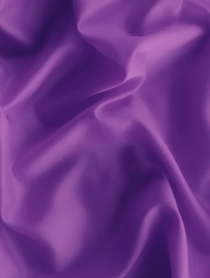 a purple fabric with very smooth folds