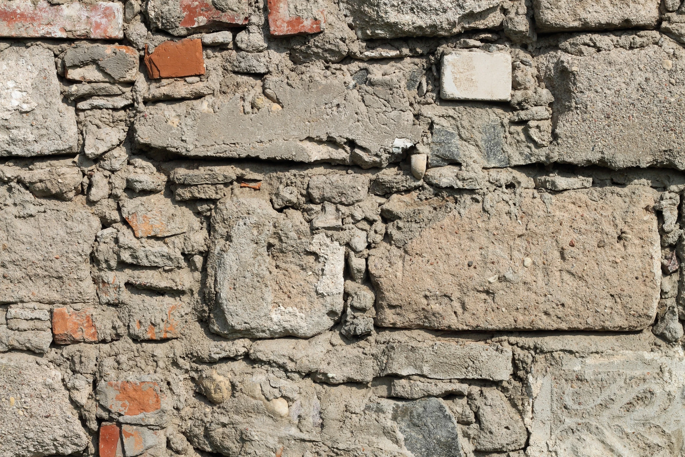 some blocks of stone are on the wall