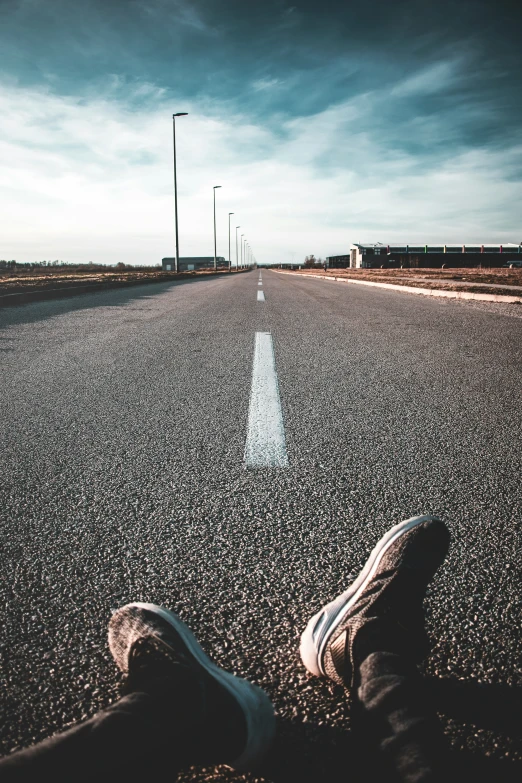 a person is standing in the middle of the street