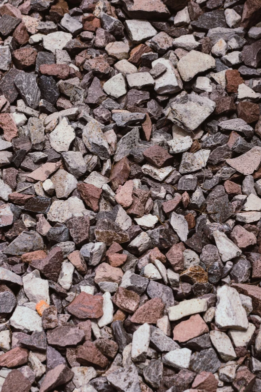 a bunch of rocks are grouped together and placed on the ground