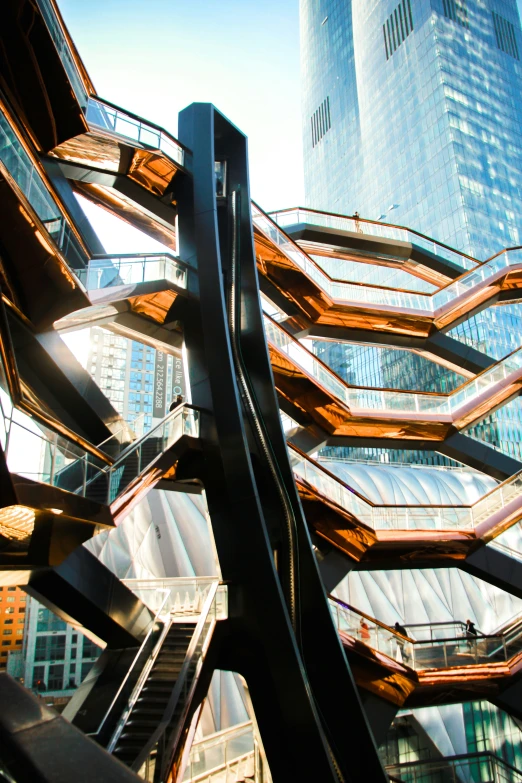 a group of stairs in front of two skyscrs