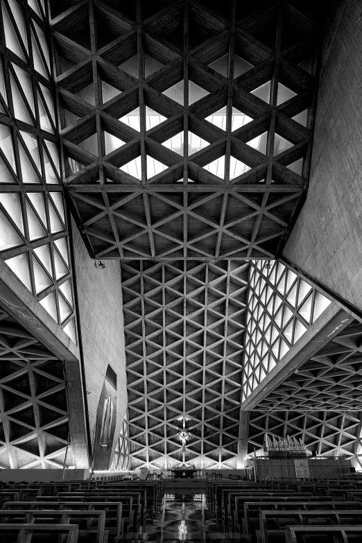 a black and white po of the ceiling in a building