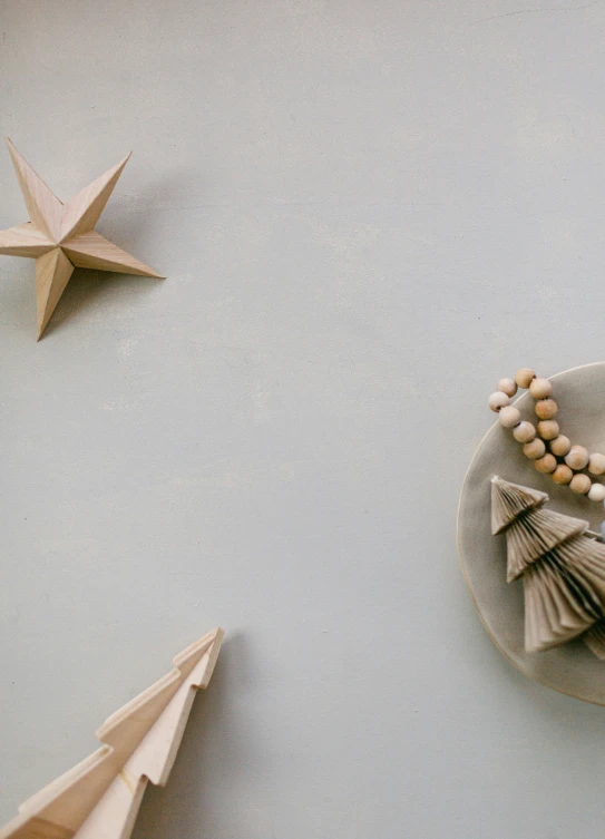 a plate on the table with a star decoration