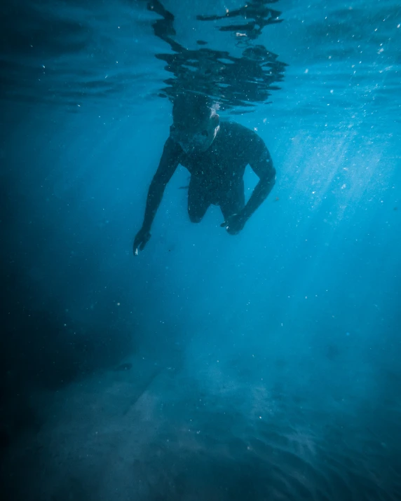 an image of a man that is underwater