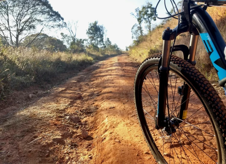 there is a bicycle that is sitting on the road