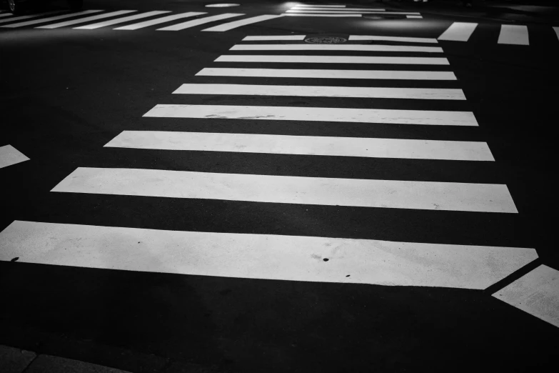 an image of a crosswalk in the dark