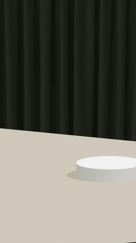 a white circular object sitting on top of a table