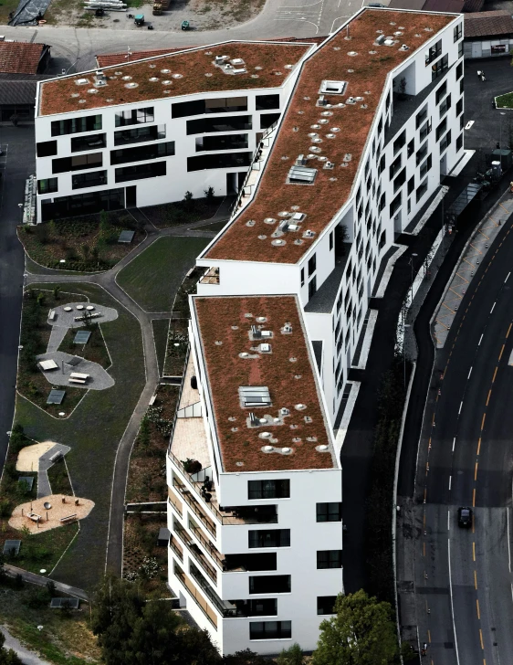 an aerial view of a large building with many windows