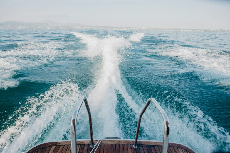 a view from the stern of a boat's wake