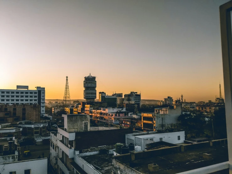 a view of a city from an apartment window