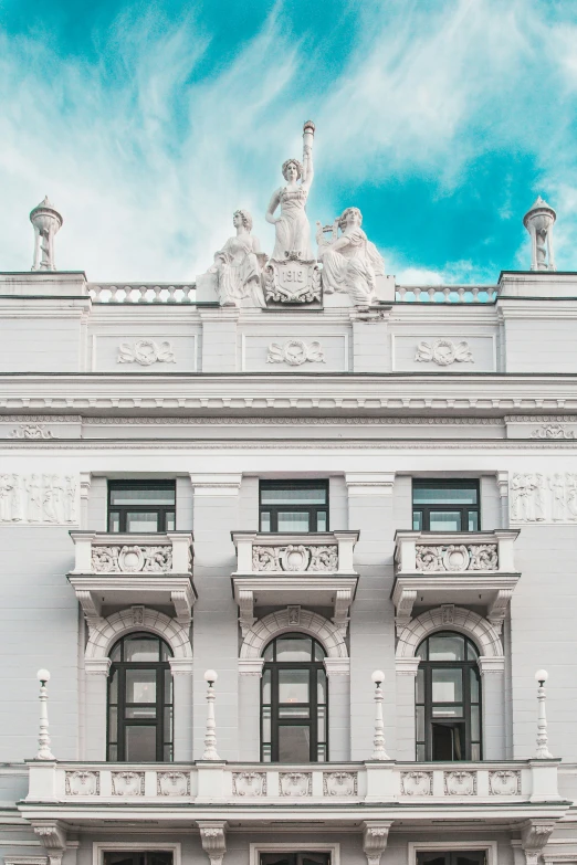 some architecture is on the front of a white building