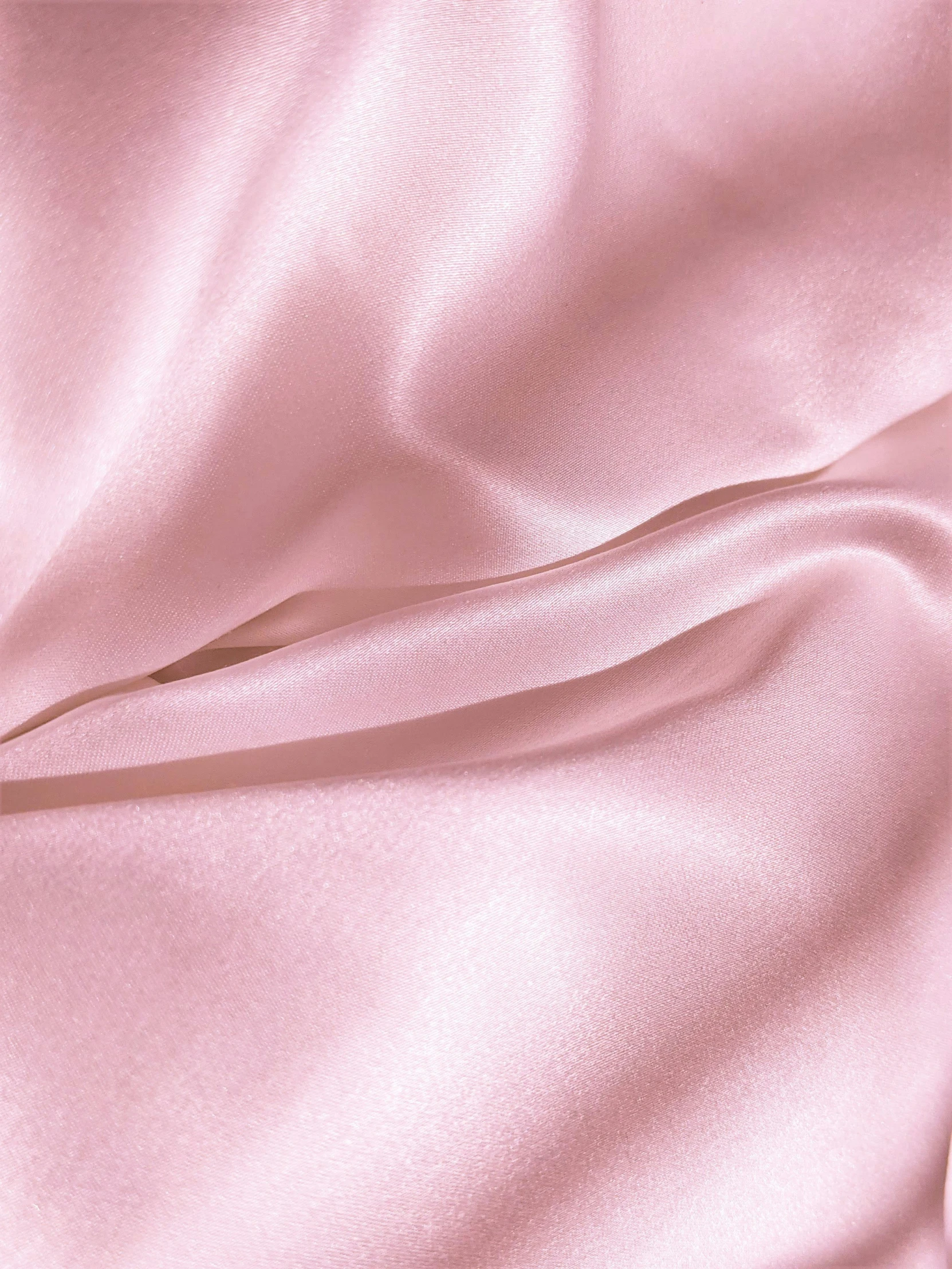 closeup image of pink satin material