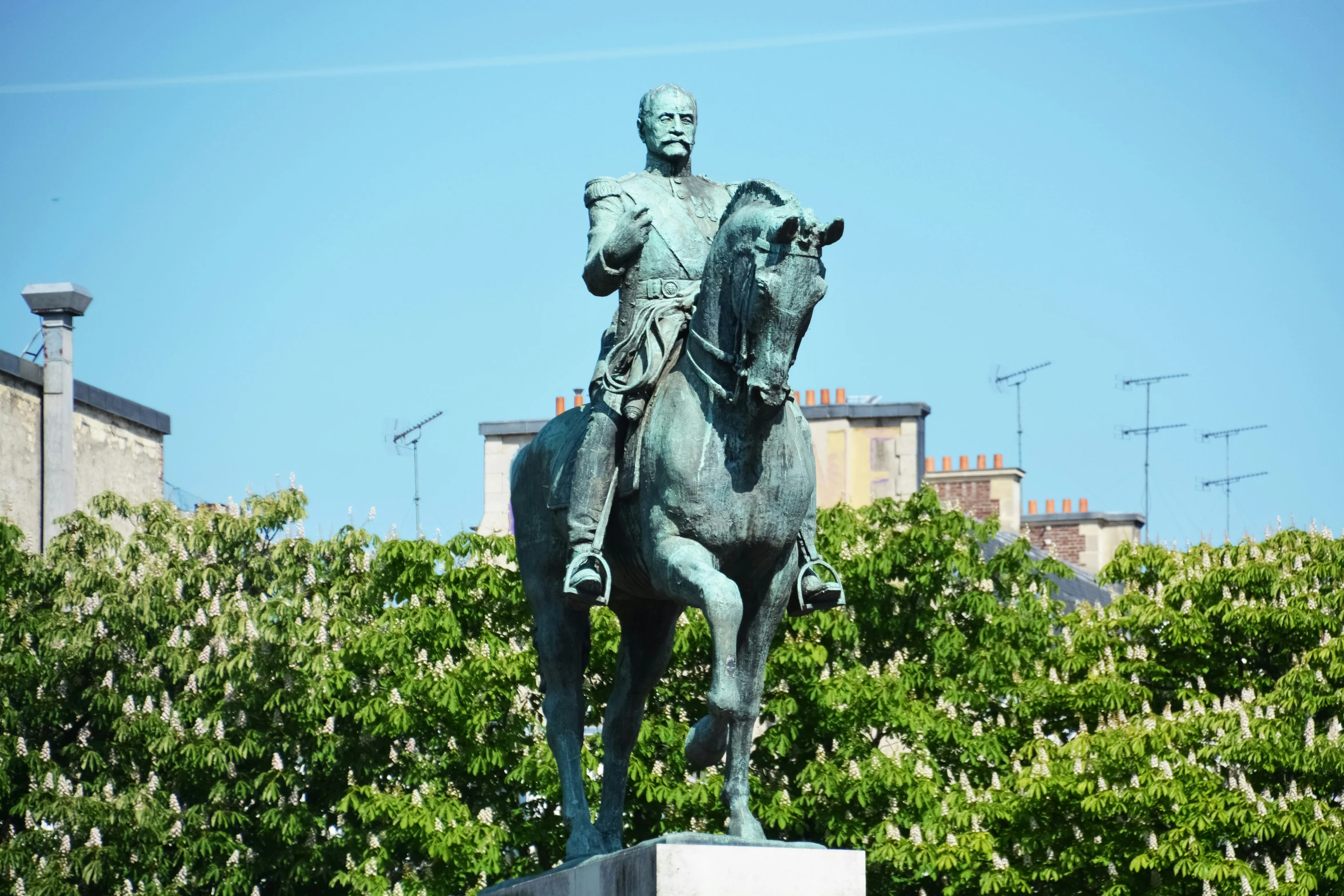 statue of a man on horseback with a sword in hand