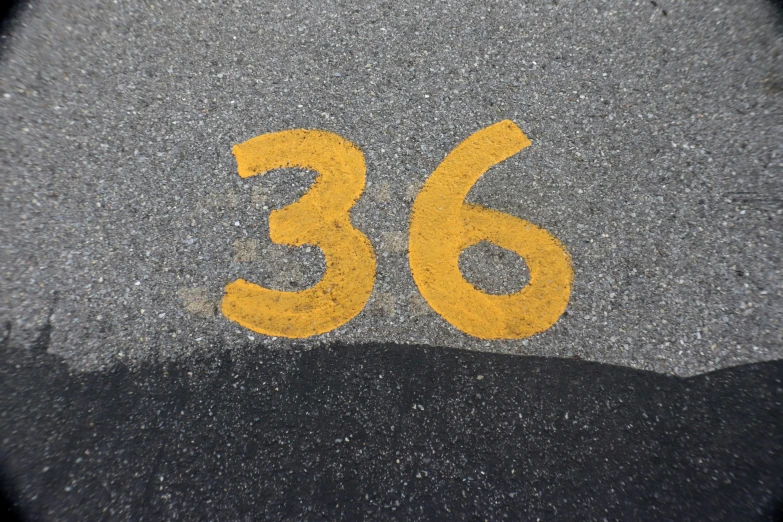 number eighty two thousand eight on asphalt, viewed from above