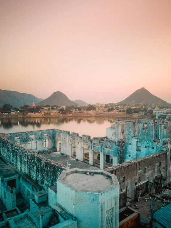 a factory in an urban area near a body of water