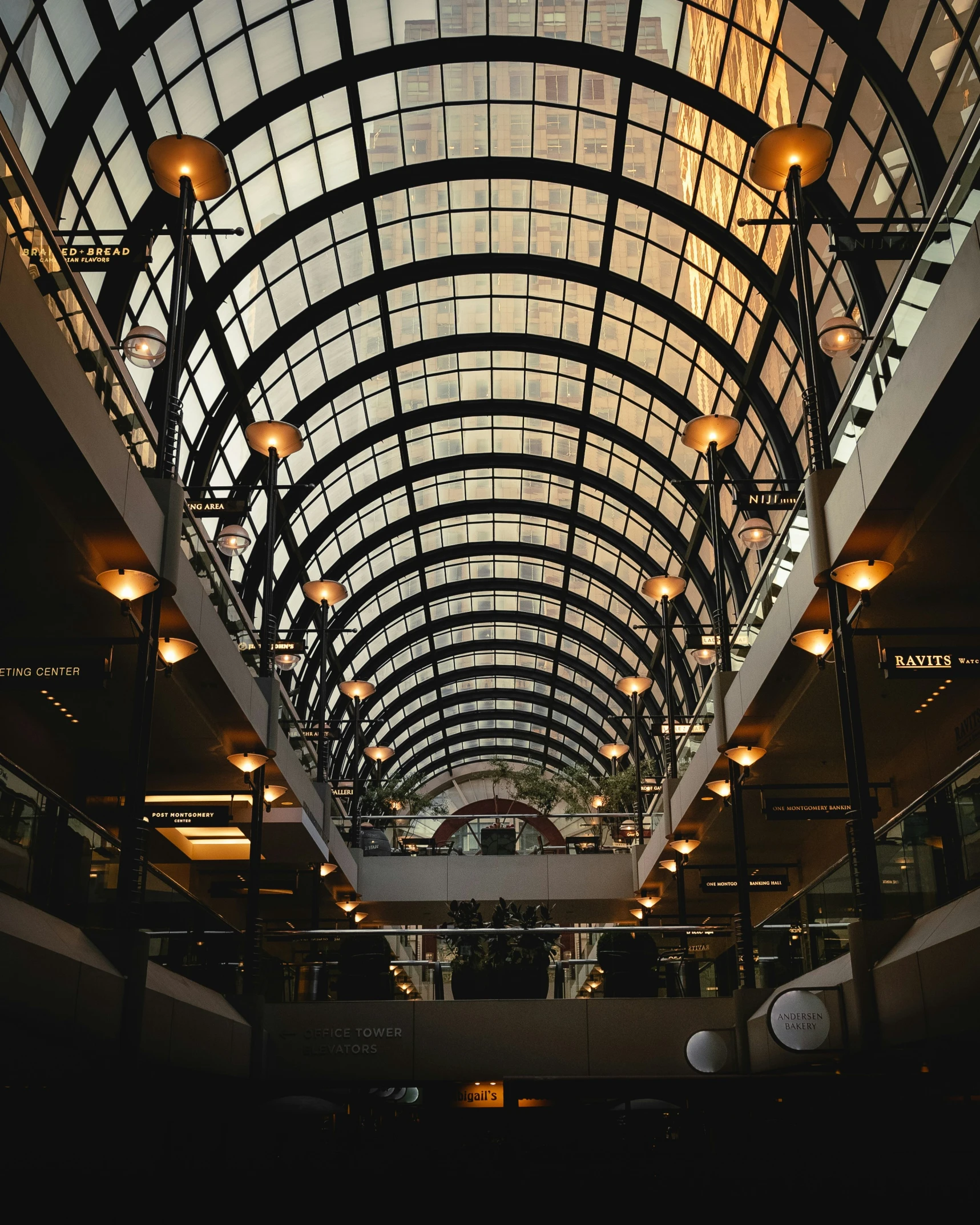 the inside of a building showing the inside glass roof