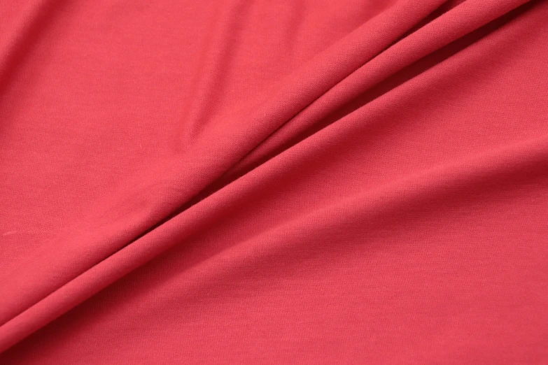 a closeup view of the texture of a red fabric