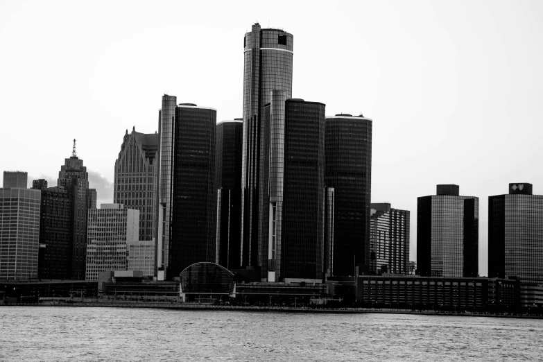 a group of buildings with the waters in front of them