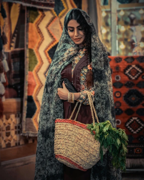 a woman with a bag in her hand and shawl on