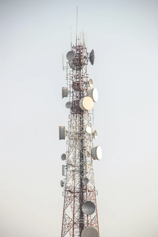 a tall tower with lots of antennas on top