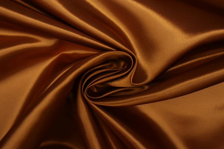 a brown silk background with folds
