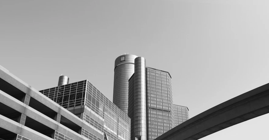 black and white po of architecture on the side of a bridge