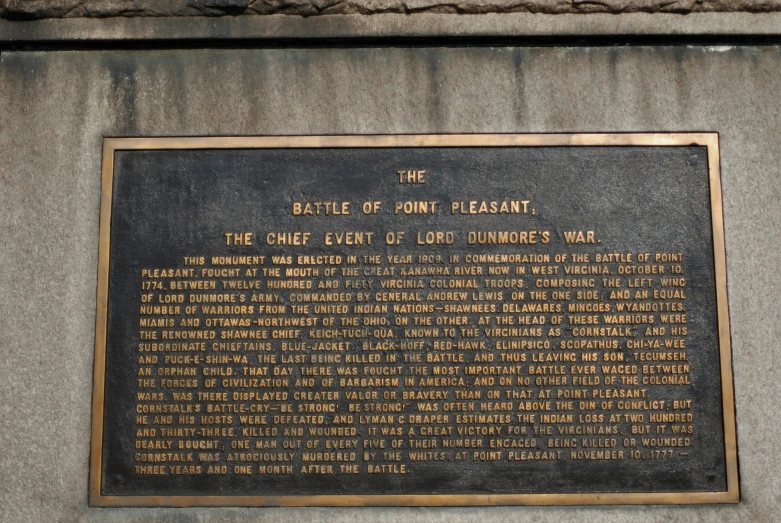 the plaque at the base of the monument is telling about its history