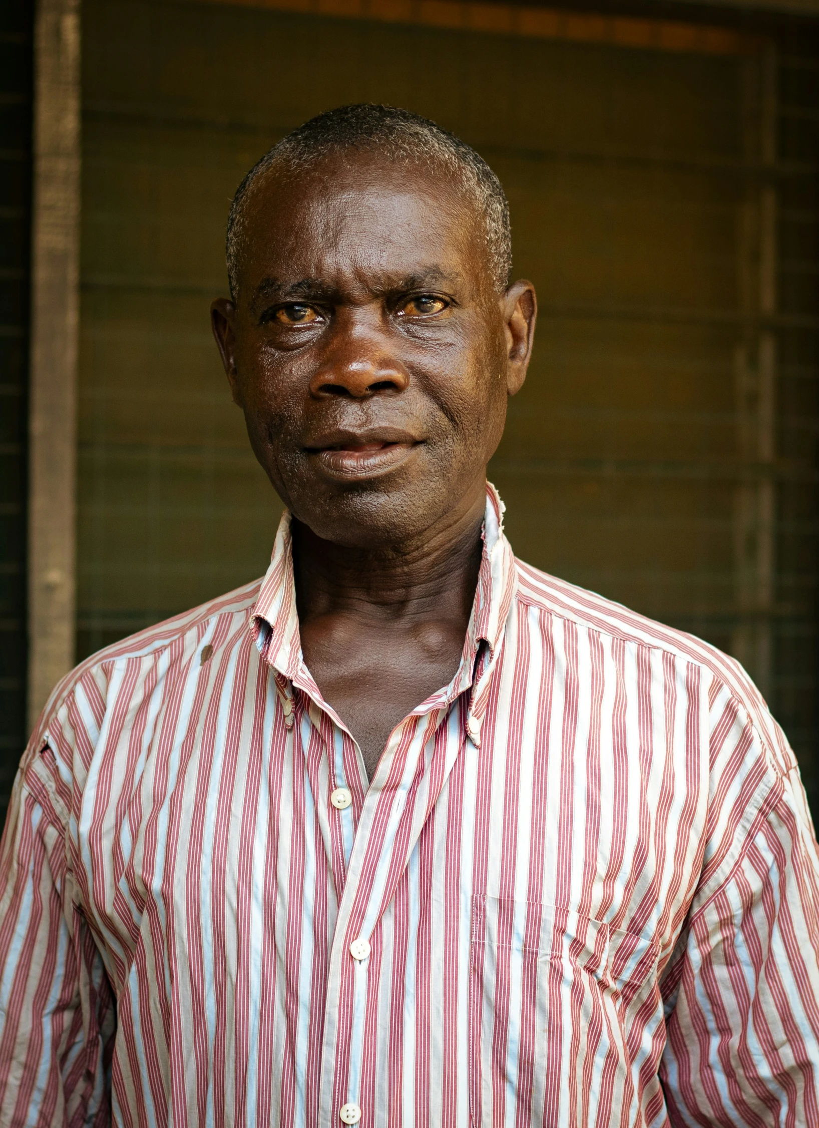 man in red and white  shirt