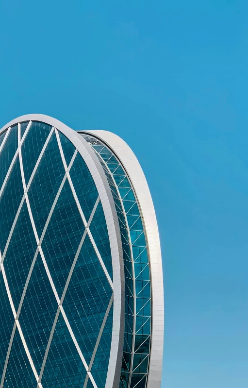 large building with metal geometric design against the sky