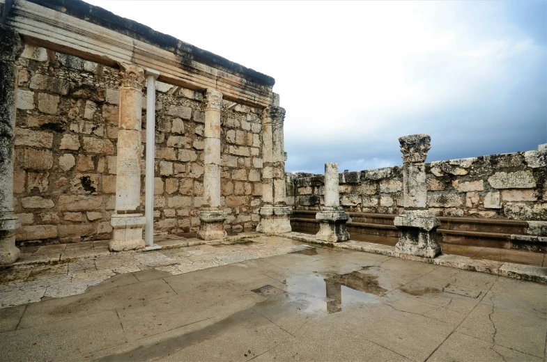 a room that is partially constructed with stone