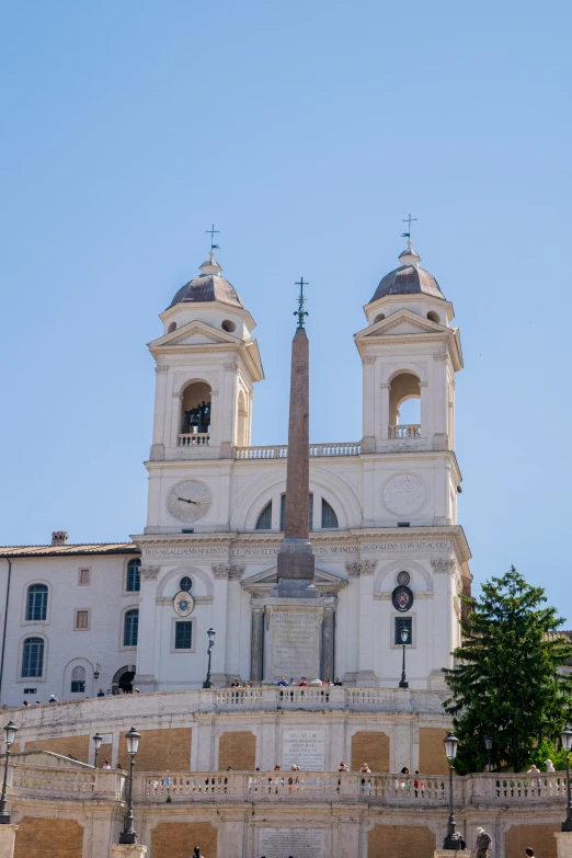 two tall towers are shown in the background