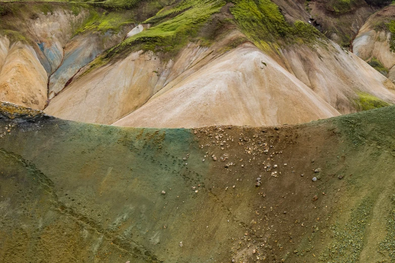 a body of water with lots of different colors on it