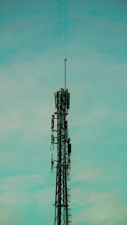 a cell phone tower has multiple antennas and cell phone towers on it