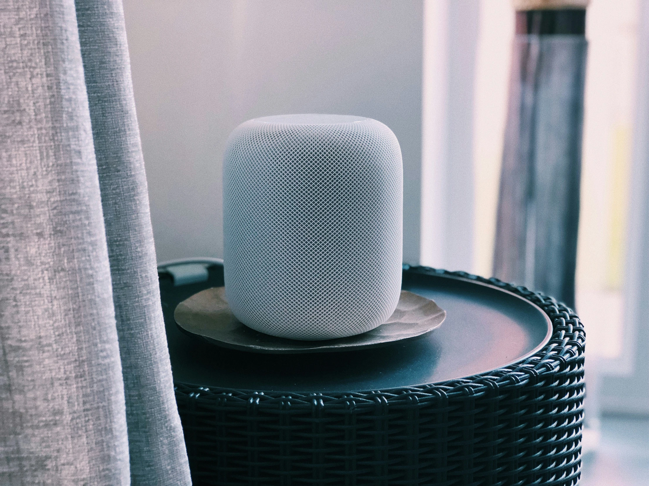 the top of a smart home device on a table in a living room