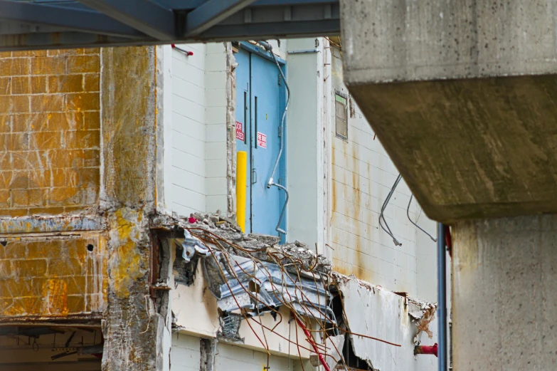 a building is in disrepair with a sign