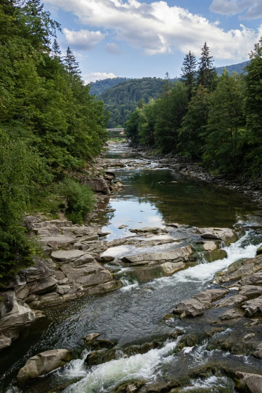 there are many stones and water on the river