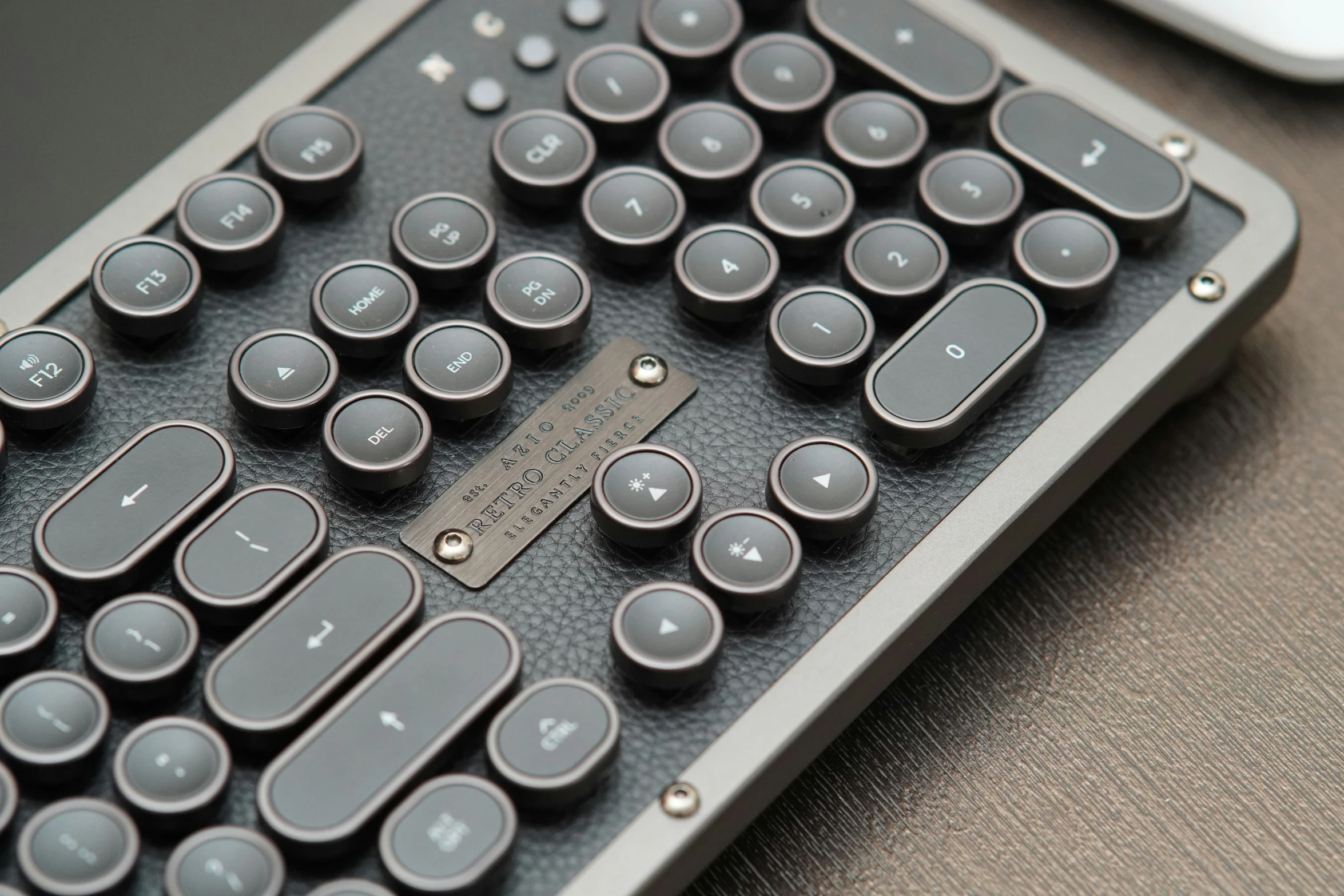 an ornate keyboard that is made of black and silver keys